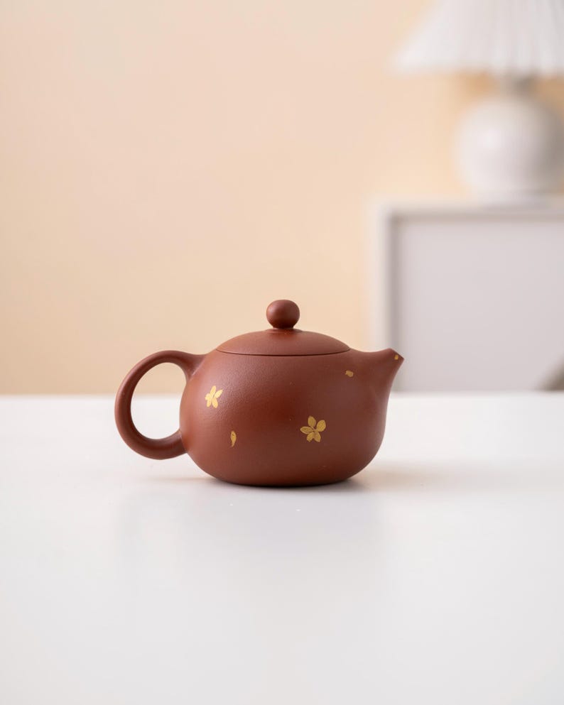 Hand-painted Gold Flower Purple Clay Xishi Teapot from Yixing 100ml